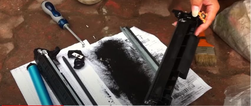 đổ mực thải khi thay mực máy in